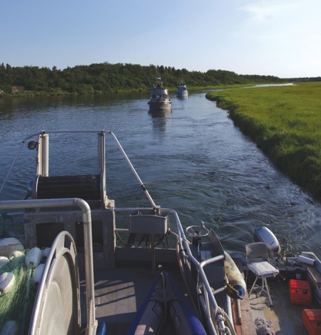 Homer-based drift gillnet boats the  through a braided stretch of the Kvichak River on June 17.