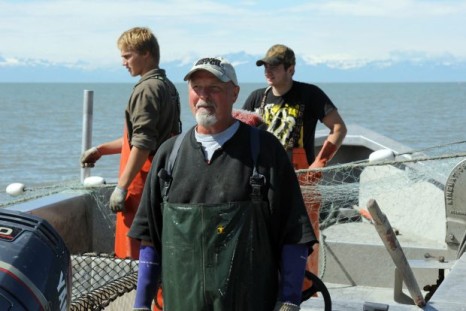 Ken Coleman, center, setnet fishes with sons Bailey, left, and Brandon on July 23, 2015