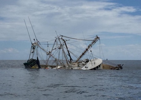 The fishing vessel Richie Rich is partially submerged 12 miles southwest of Point Au Fer in the Gulf of Mexico, Aug. 31, 2015