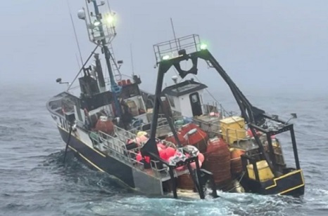 Supply ships, Coast Guard help rescue seven people and two dogs from sinking fishing vessel